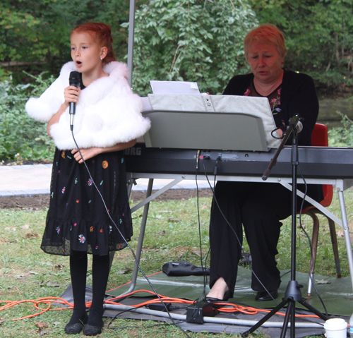 6 year old Eva  singing in the Russian Cultural Garden